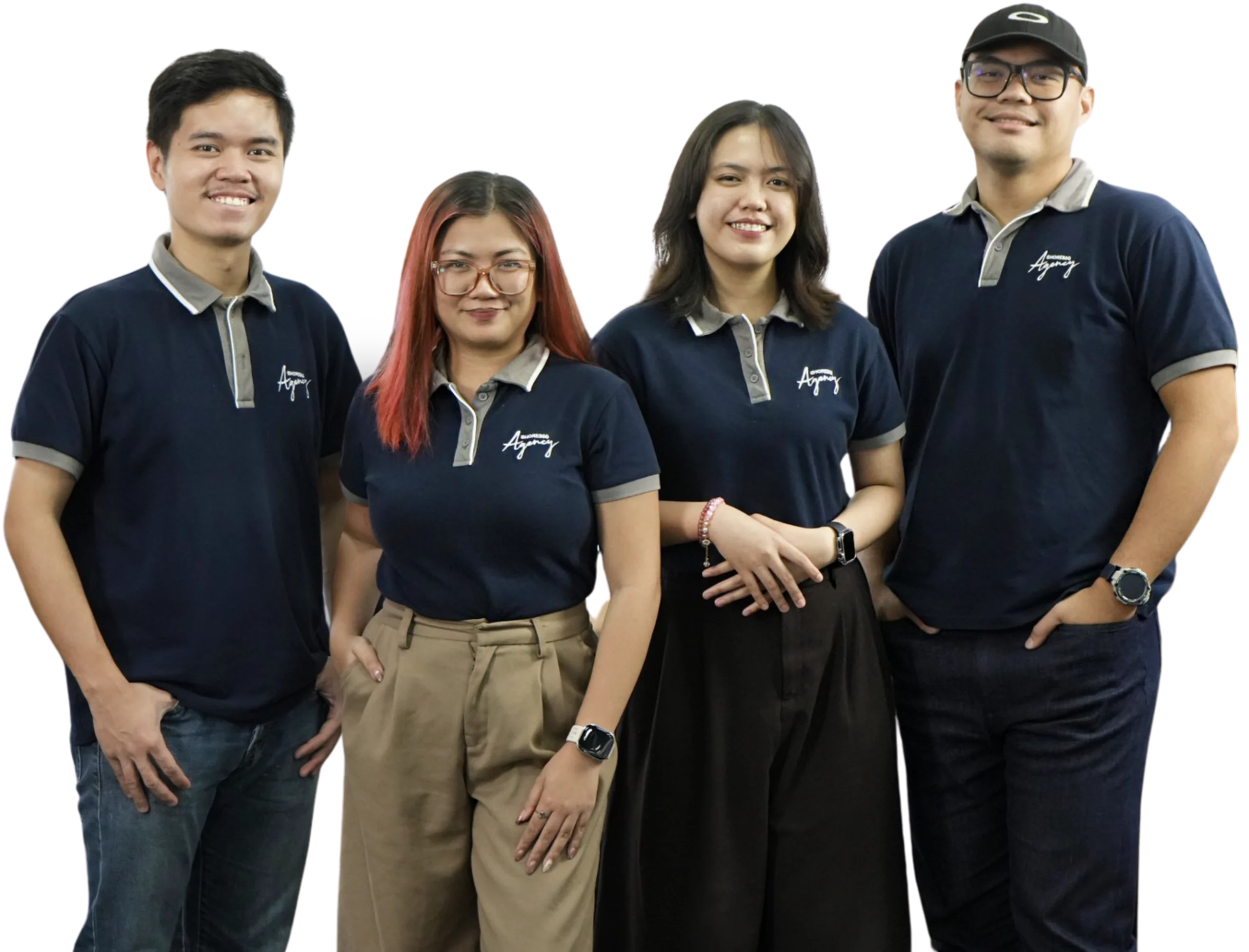A diverse team of four digital marketing professionals standing together in matching navy blue agency uniforms against a transparent background.